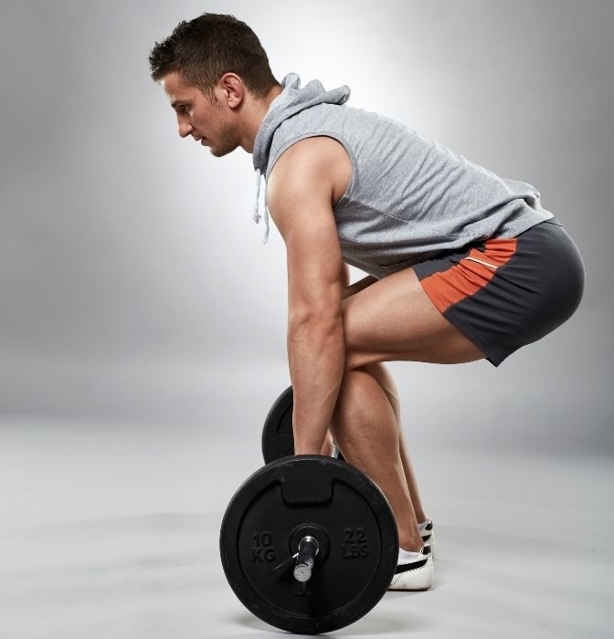 man starting stages of deadlift